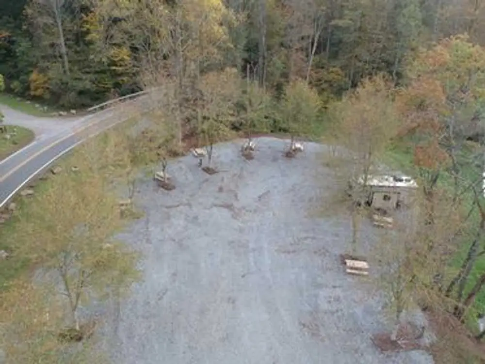Aerial view of partial hookup RV sites in the forest – Partial Hookup RV Site at The Outpost NRG