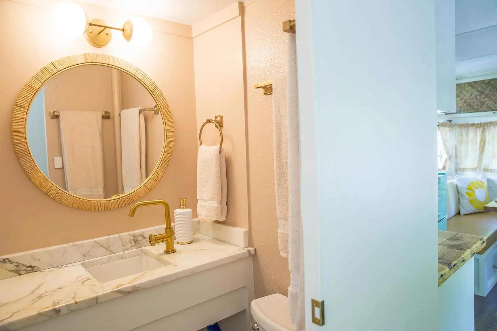 Mellow Yellow full bathroom – Mellow Yellow Vintage Camper at The Outpost NRG