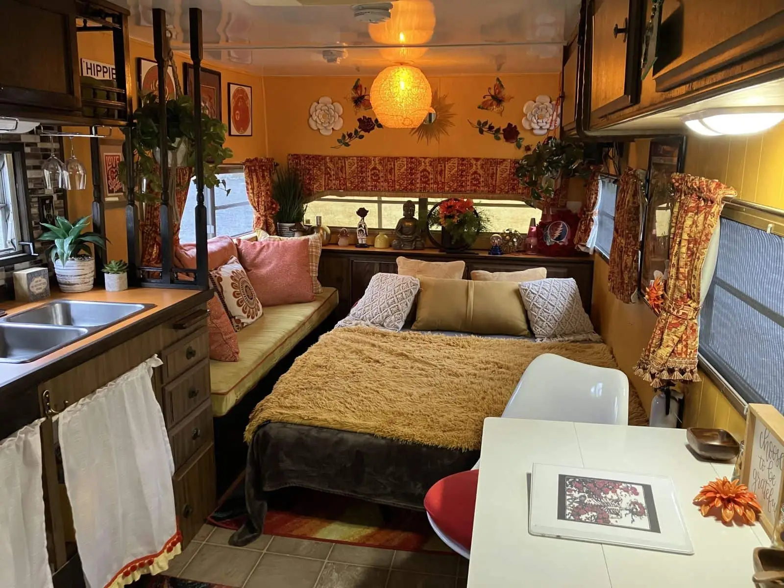 Begonia bedroom with queen futon – Begonia Vintage Camper at The Outpost NRG