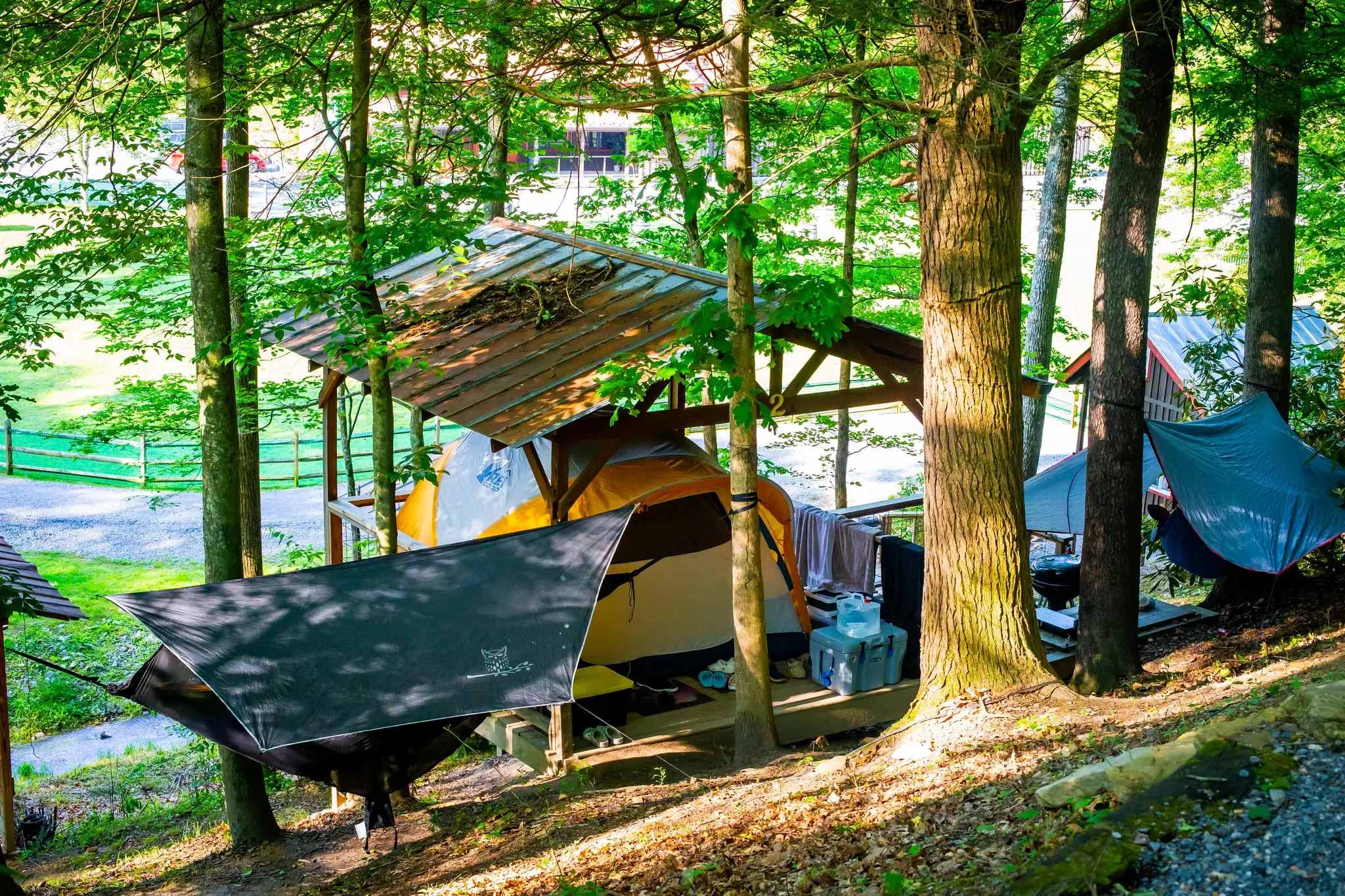 Covered canopy over a tent platform – Tent Platforms at The Outpost NRG