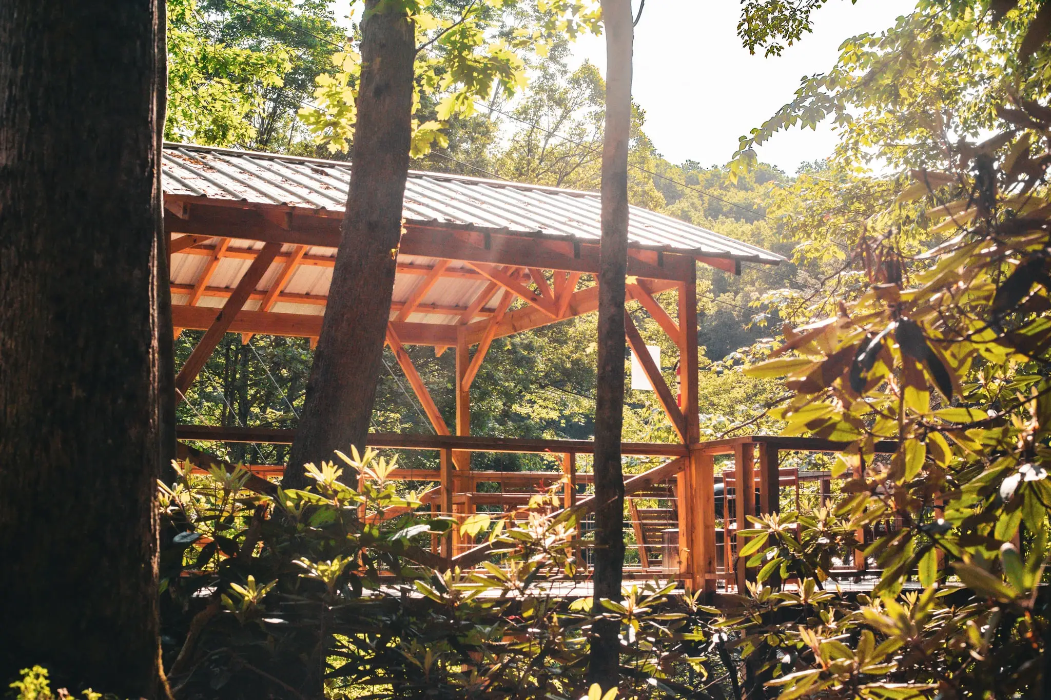 Wooden tent platform deck with railing – Tent Platforms at The Outpost NRG