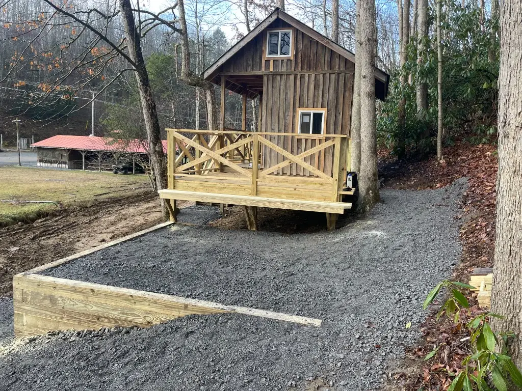 Rustic Family Cabin with deck and gravel patio – Rustic Family Cabin at The Outpost NRG
