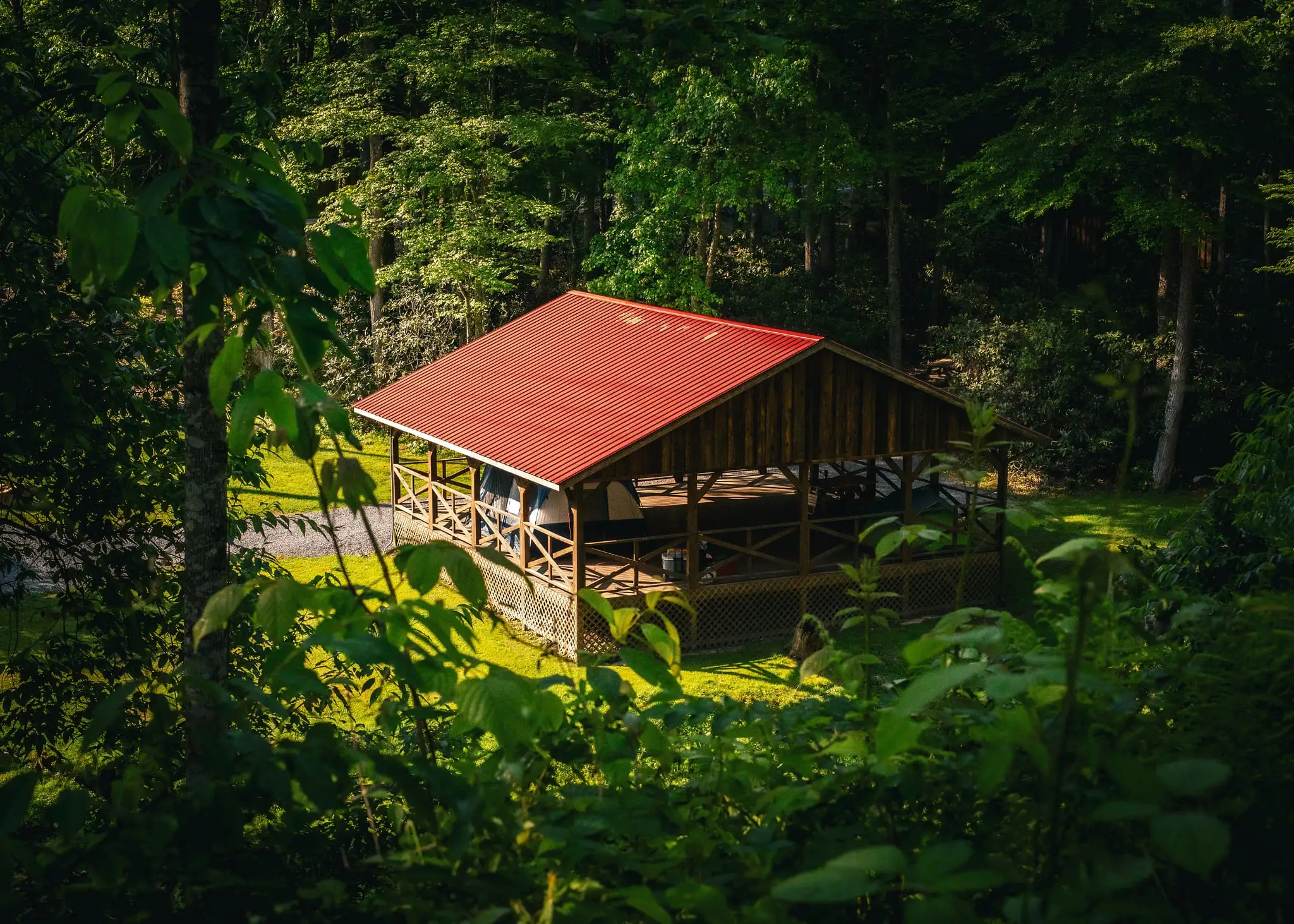 Tent pavilion nestled in the forest – Tent Pavilion at The Outpost NRG