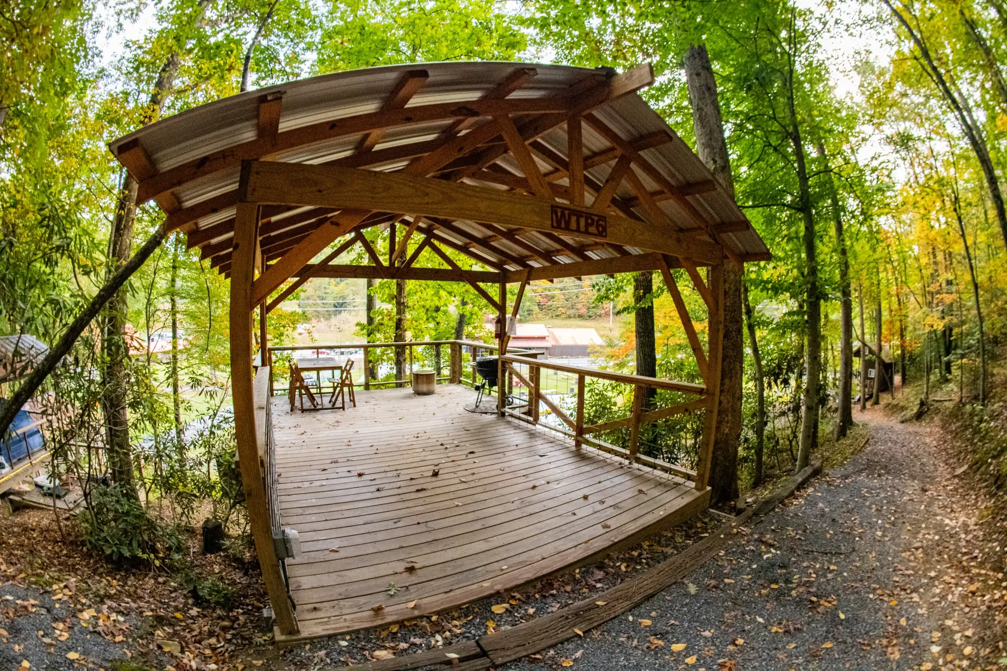Tent platform with charcoal grill and table – Tent Platforms at The Outpost NRG