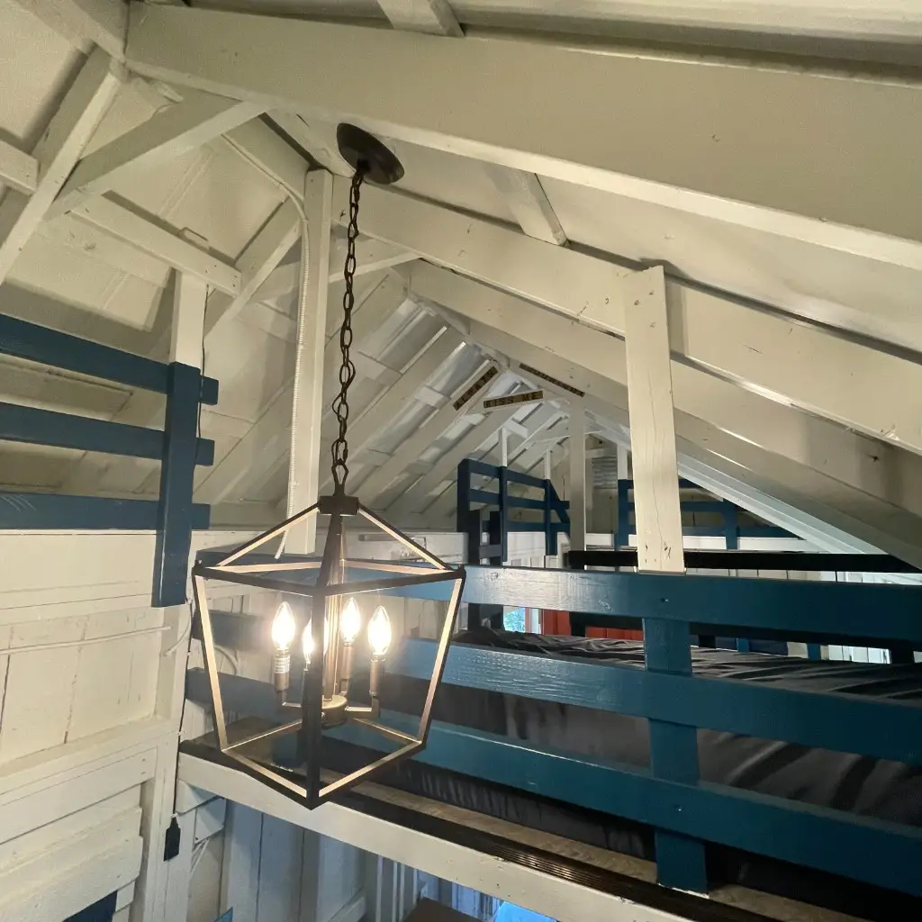 Rustic Big Family Cabin loft with bunk beds and lantern – Rustic Big Family Cabin at The Outpost NRG