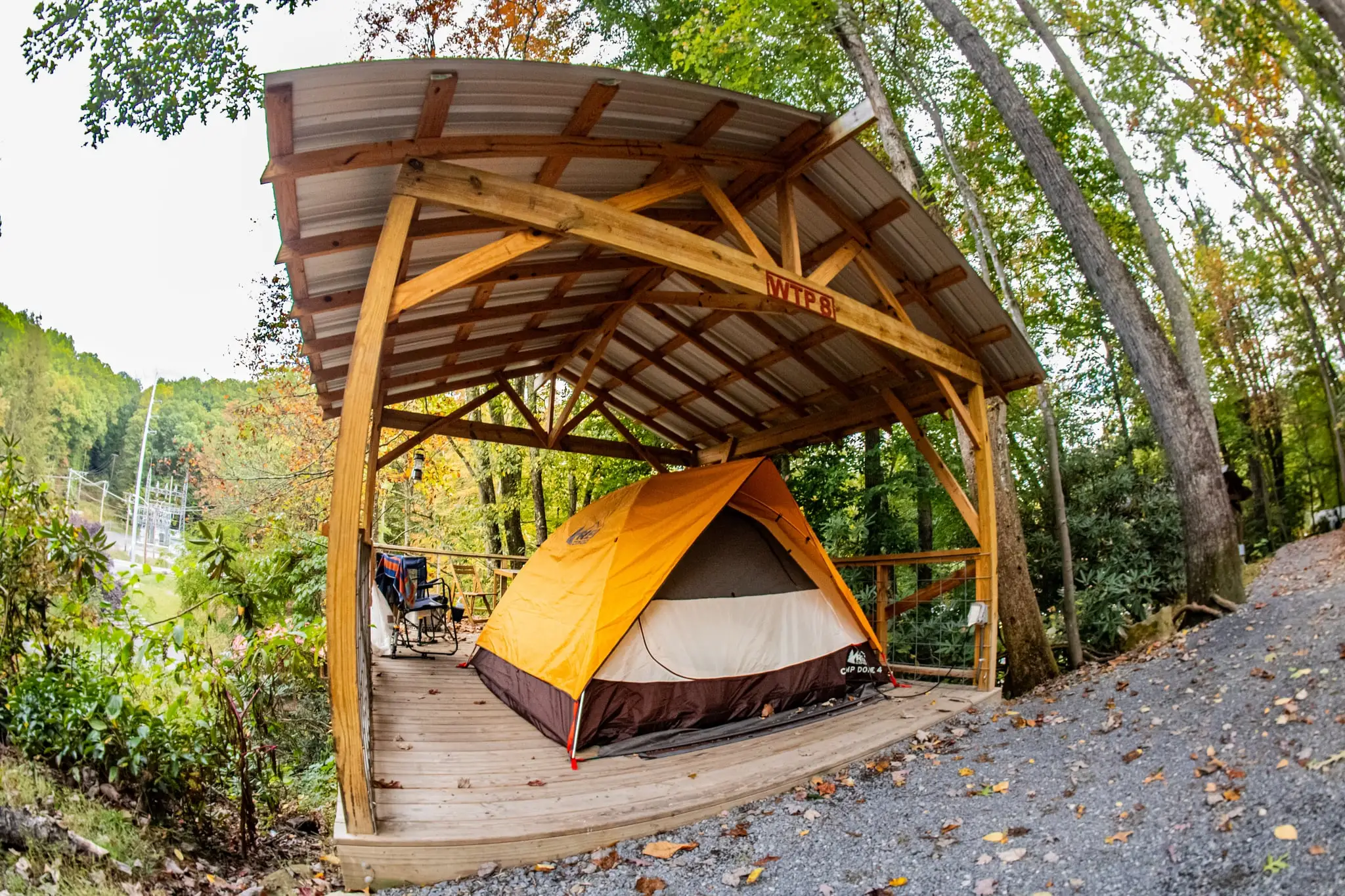Elevated tent platform patio in the trees – Tent Platforms at The Outpost NRG