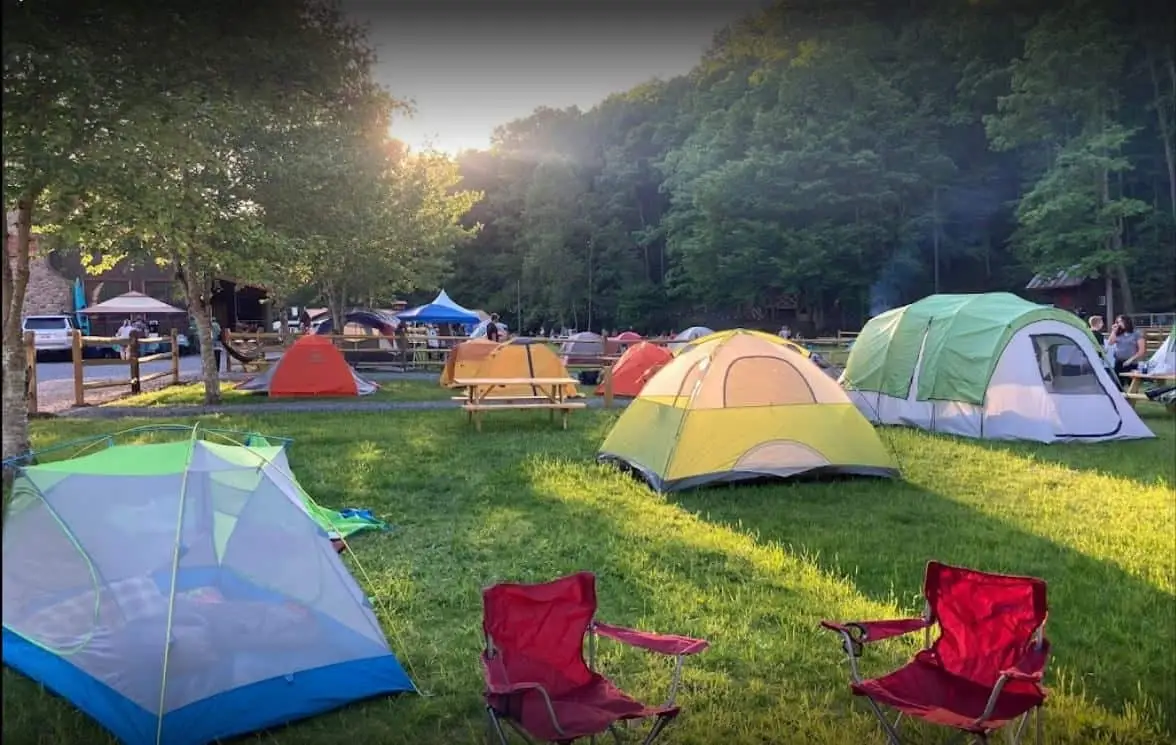 Upper Outpost tent sites beside the music field – Tent Sites at The Outpost NRG