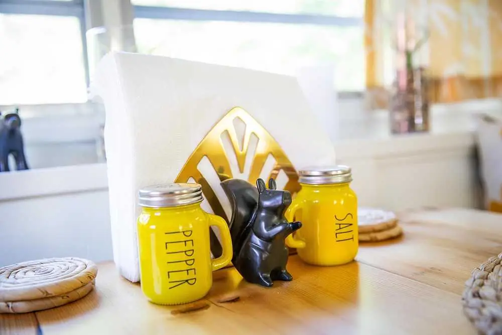 Mellow Yellow tabletop with salt and pepper shakers – Mellow Yellow Vintage Camper at The Outpost NRG