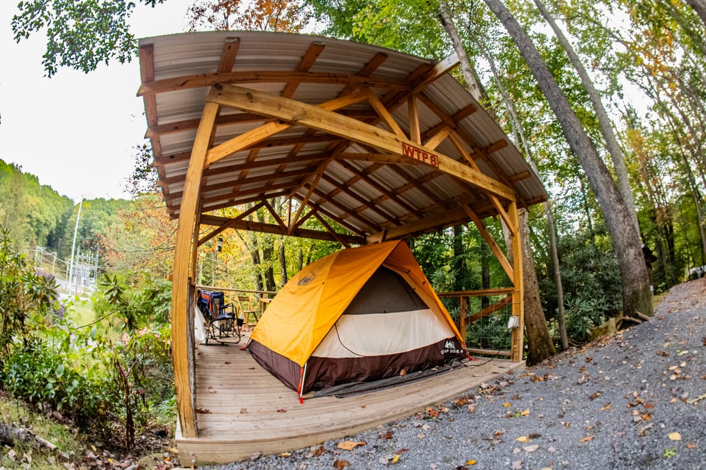 Elevated tent platform patio in the trees – Tent Platforms at The Outpost NRG