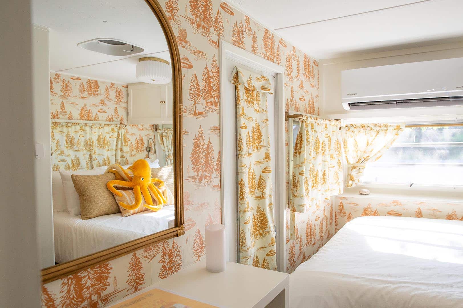 Mellow Yellow bedroom with alien abduction wallpaper – Mellow Yellow Vintage Camper at The Outpost NRG